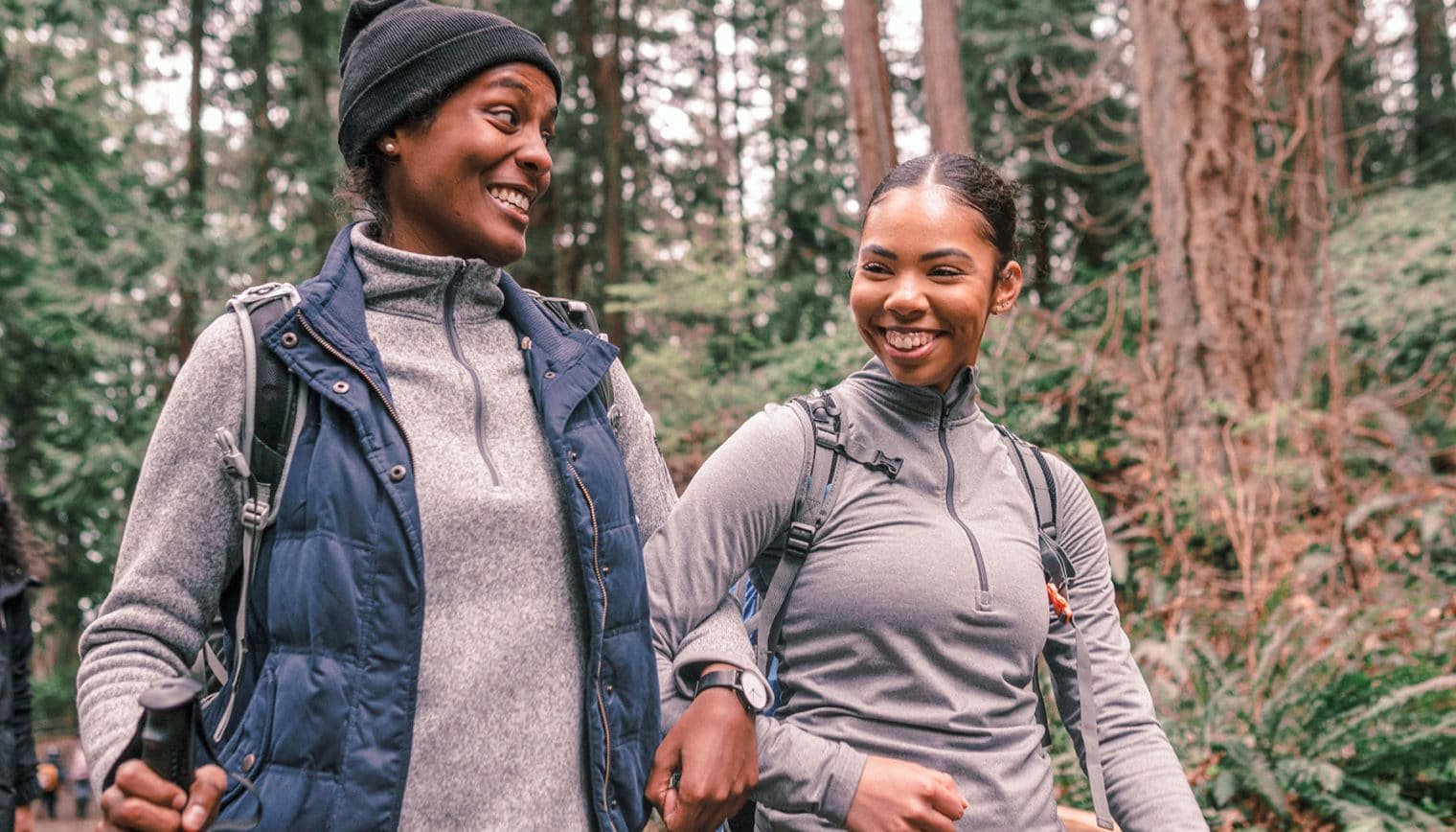 Two women hiking together.