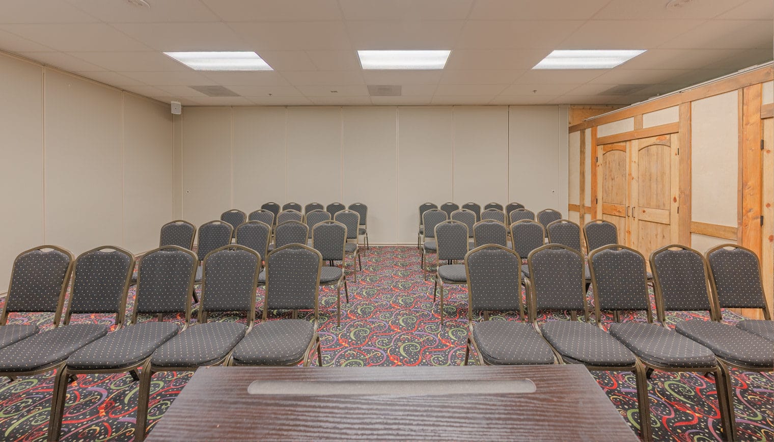 Shasta meeting space facing rows of seats.